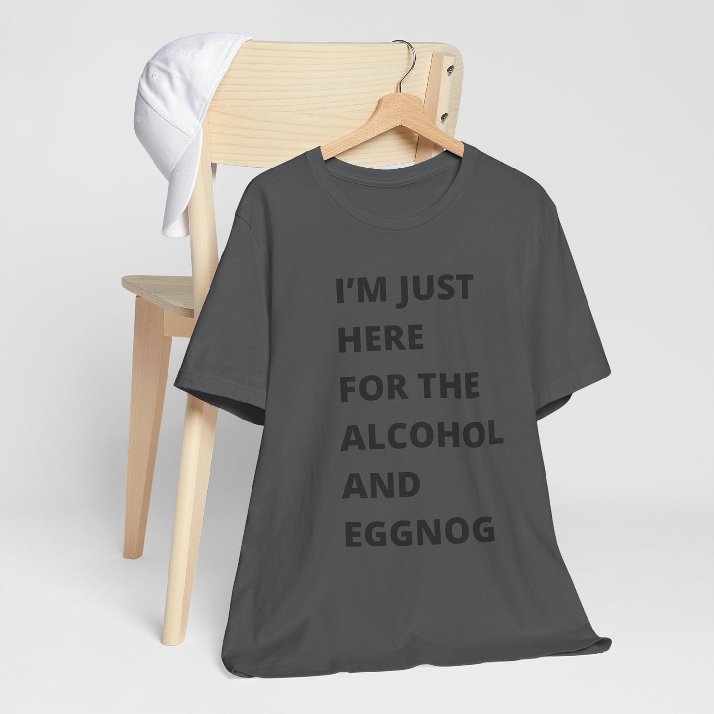 Funny Holiday Tee - 'I’m Just Here for the Alcohol and Eggnog' Unisex Jersey Short Sleeve Shirt