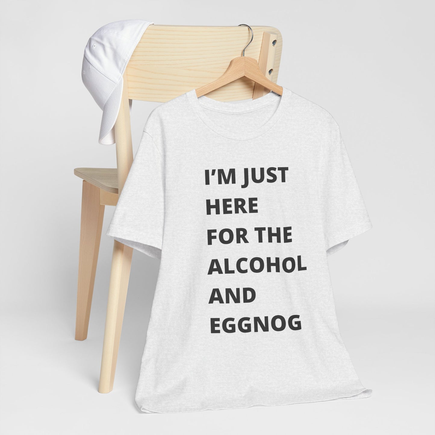 Funny Holiday Tee - 'I’m Just Here for the Alcohol and Eggnog' Unisex Jersey Short Sleeve Shirt