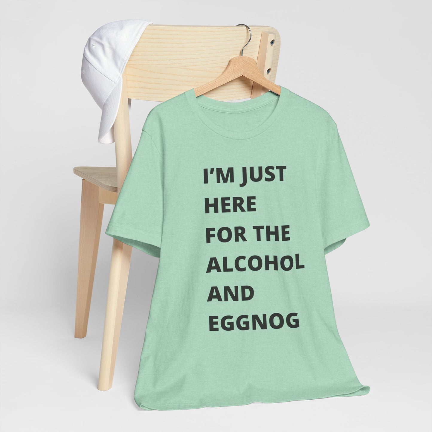 Funny Holiday Tee - 'I’m Just Here for the Alcohol and Eggnog' Unisex Jersey Short Sleeve Shirt