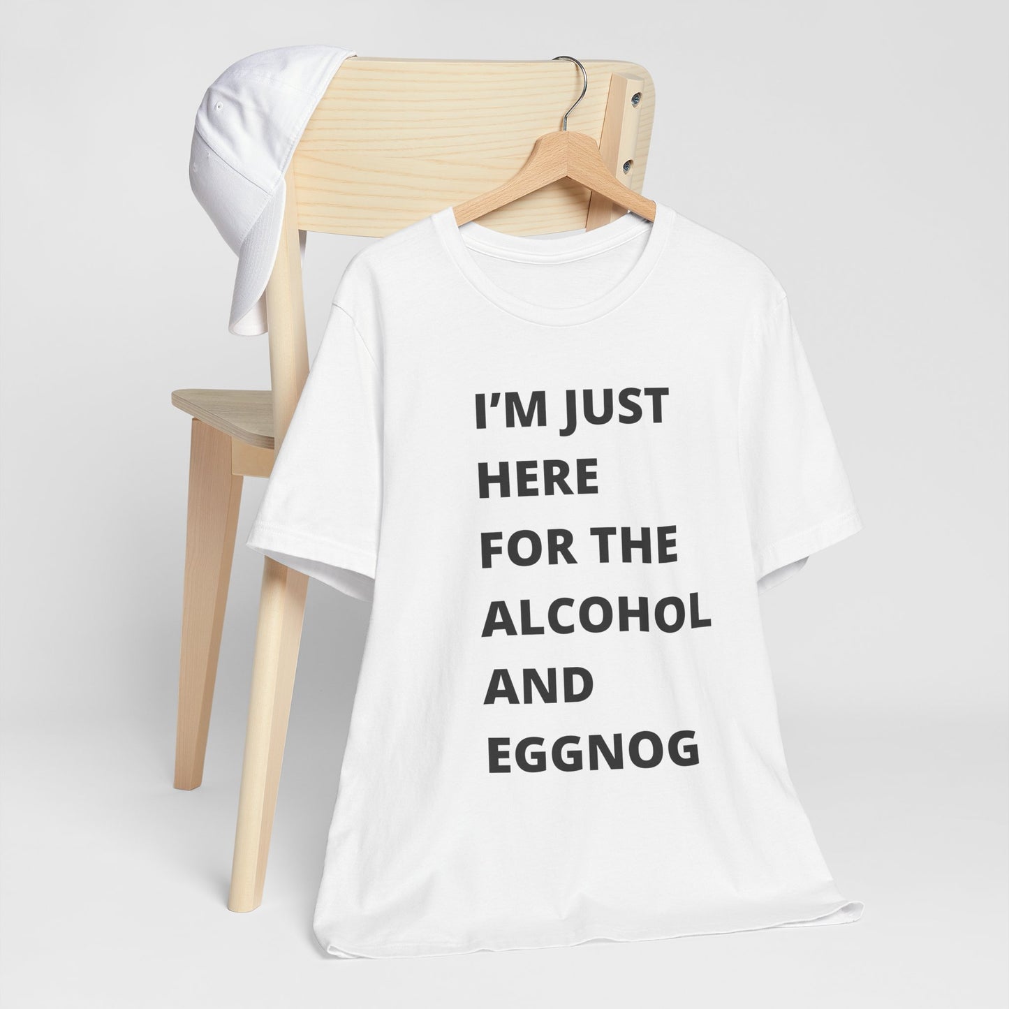 Funny Holiday Tee - 'I’m Just Here for the Alcohol and Eggnog' Unisex Jersey Short Sleeve Shirt